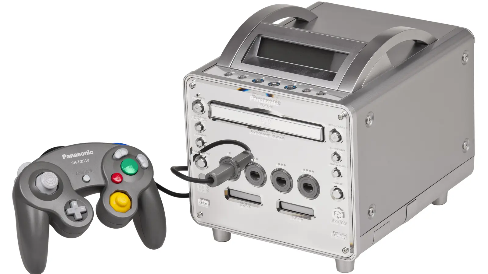 A silver Panasonic Q console and controller against a light background