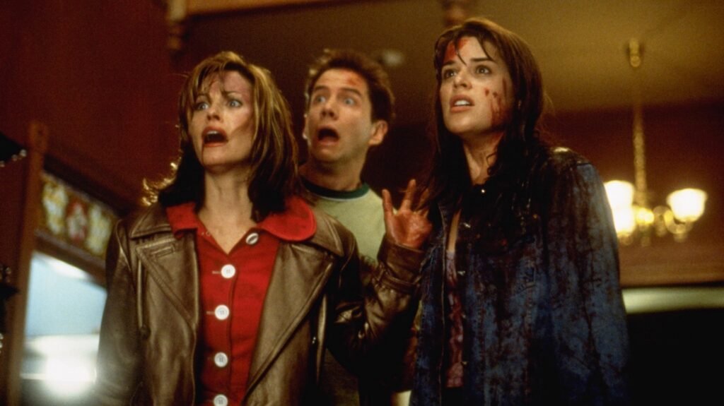 Gale, Randy and Sidney look toward danger in the original Scream film