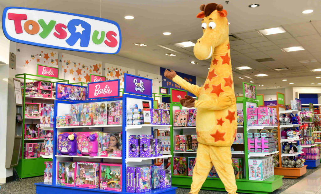 Geoffrey the Giraffe inside a Toys R Us shop at Macy’s