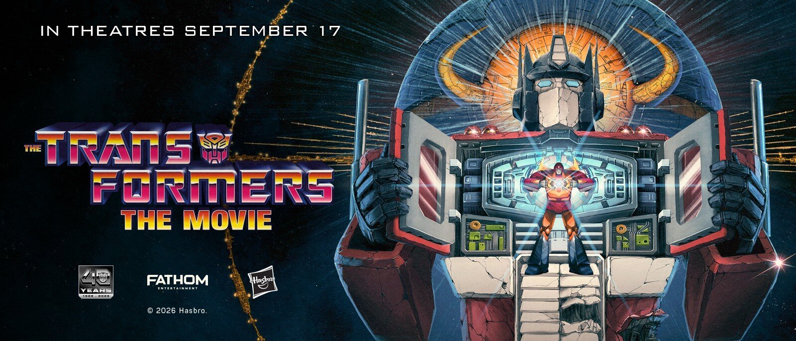 Official Transformers fortieth-anniversary artwork showing Optimus Prime, Hot Rod and Unicron